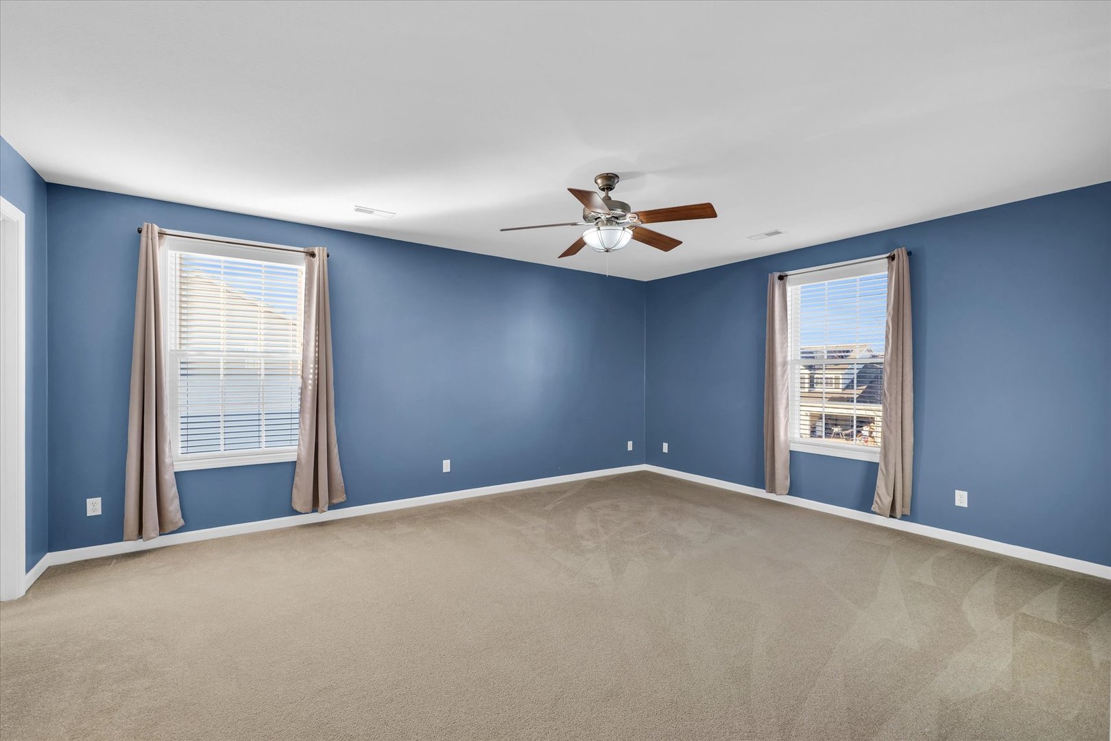 1330 West Ridge Lane Champaign, IL 61822 - Photo 22 of 39 a view of an empty room with a window