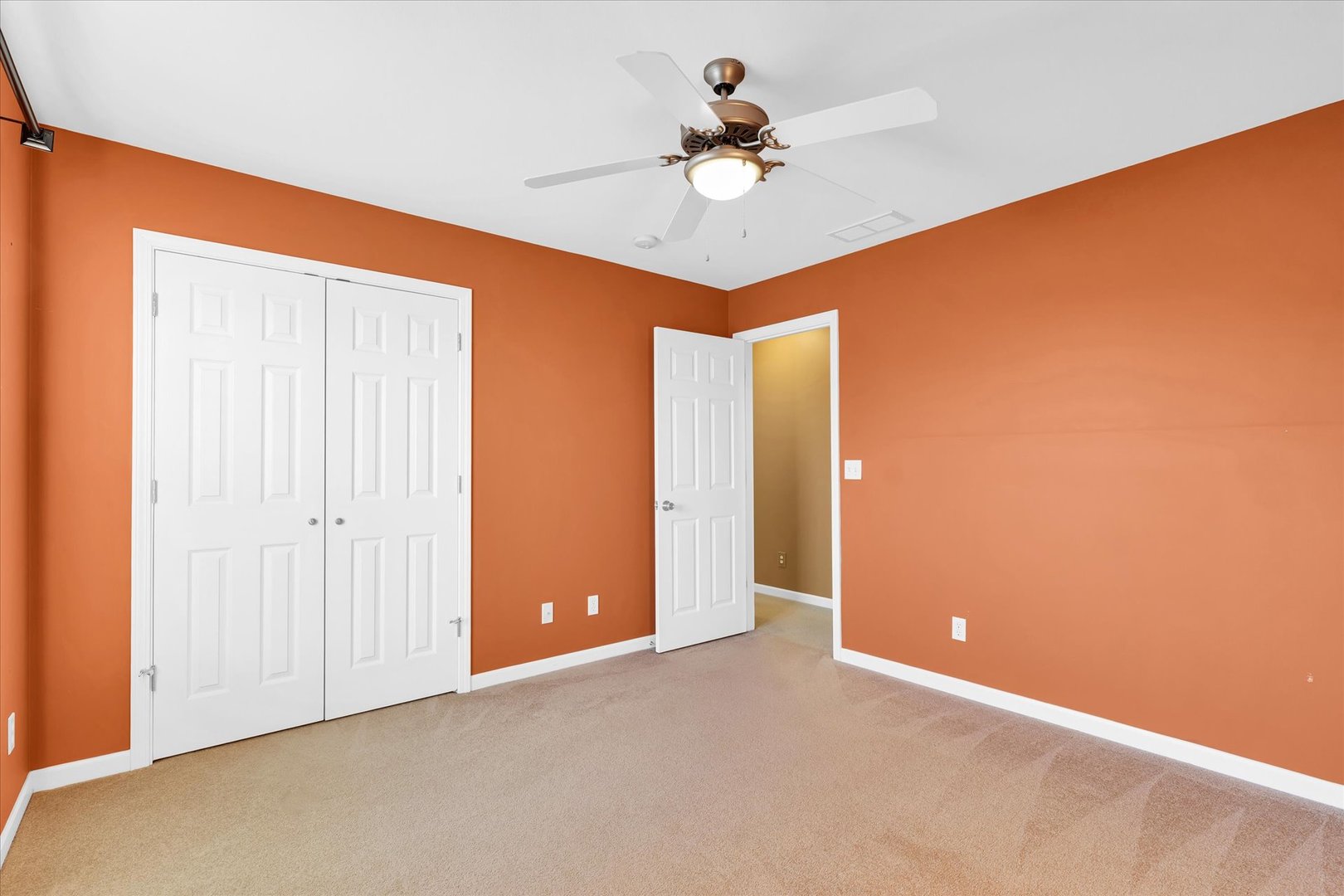 1330 West Ridge Lane Champaign, IL 61822 - Photo 26 of 39 an empty room with closet and fan