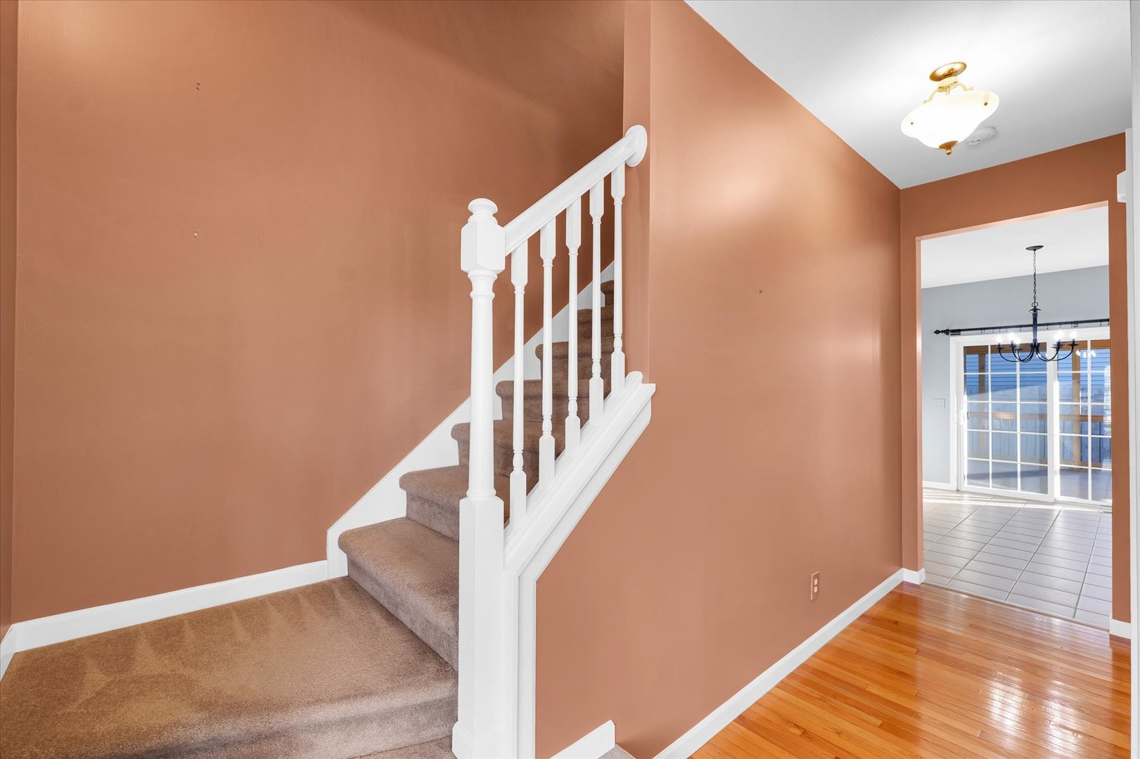 1330 West Ridge Lane Champaign, IL 61822 - Photo 3 of 39 a view of an entryway with wooden floor