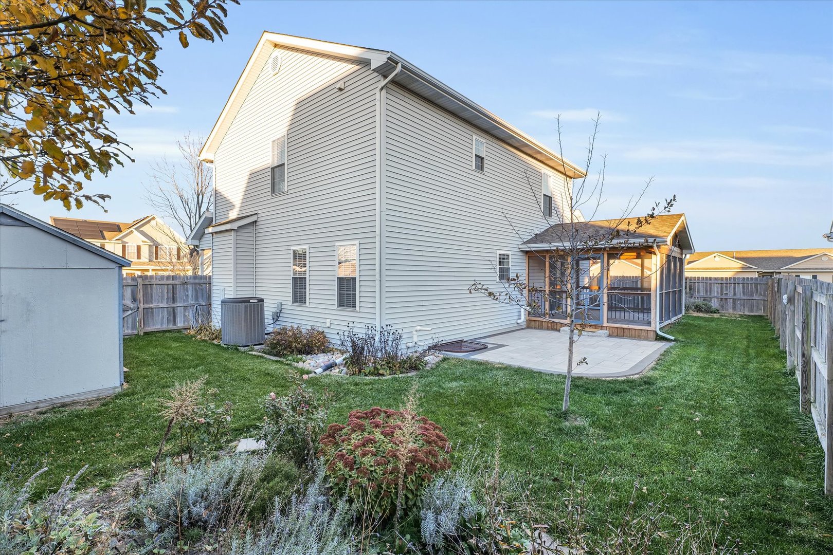 1330 West Ridge Lane Champaign, IL 61822 - Photo 34 of 39 a front view of a house with garden