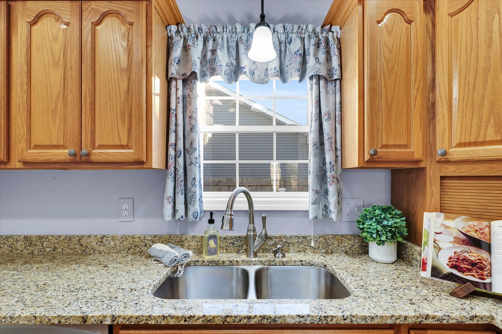 1330 West Ridge Lane Champaign, IL 61822 - Photo 9 of 39 a kitchen with sink refrigerator and window