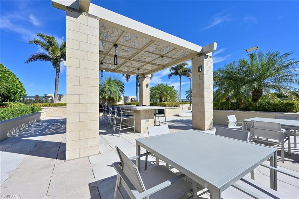 9115 Strada Place, Unit 5211 Naples, FL 34108 - Photo 16 of 31 a view of outdoor space yard and patio