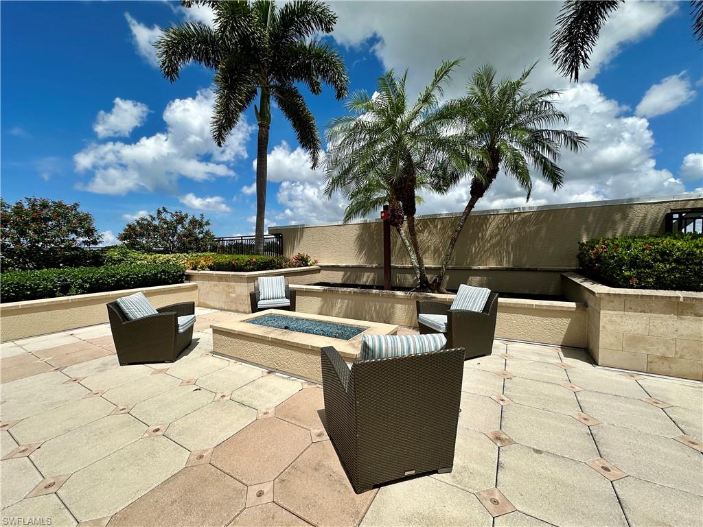 9115 Strada Place, Unit 5211 Naples, FL 34108 - Photo 18 of 31 a view of outdoor space with swimming pool