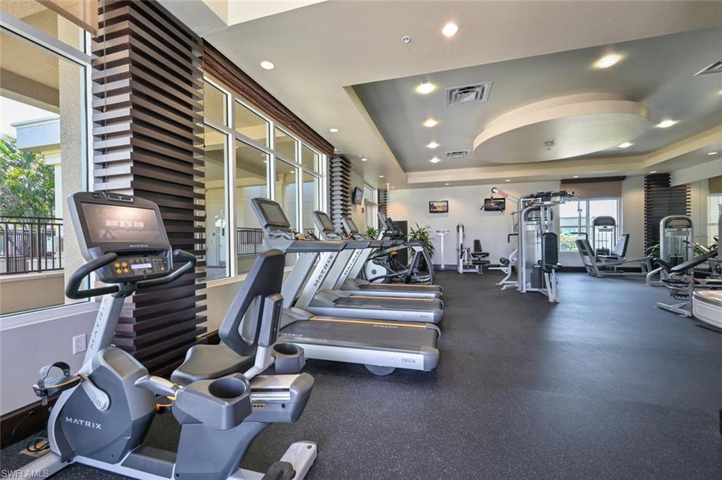 9115 Strada Place, Unit 5211 Naples, FL 34108 - Photo 22 of 31 a room with gym equipment