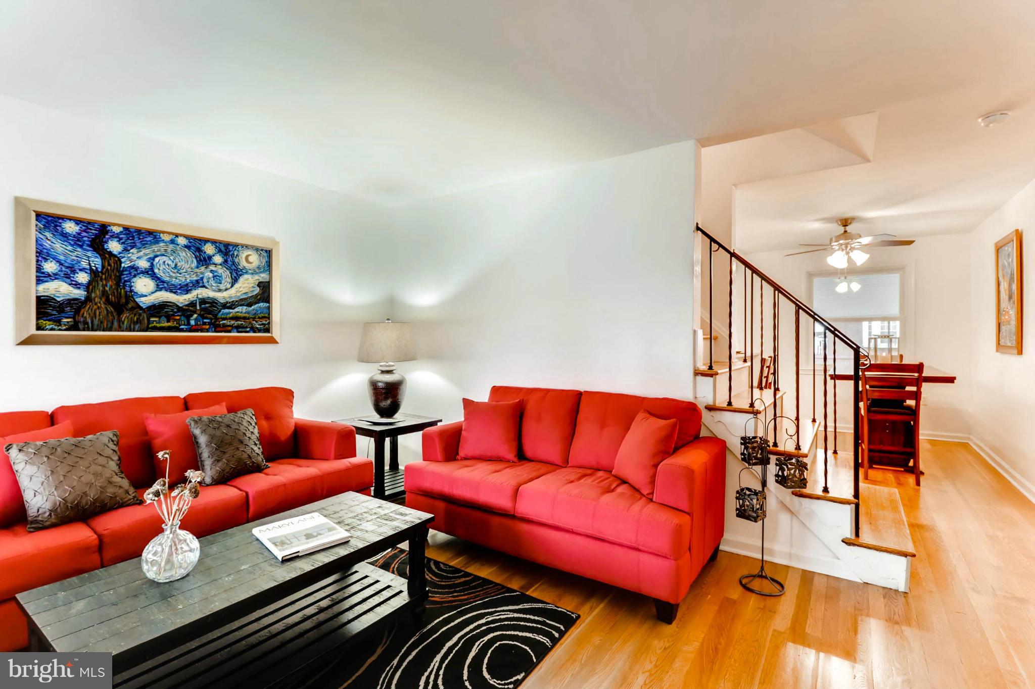 8405 Kavanagh Road Baltimore, MD 21222 - Photo 20 of 30 a living room with furniture and a flat screen tv