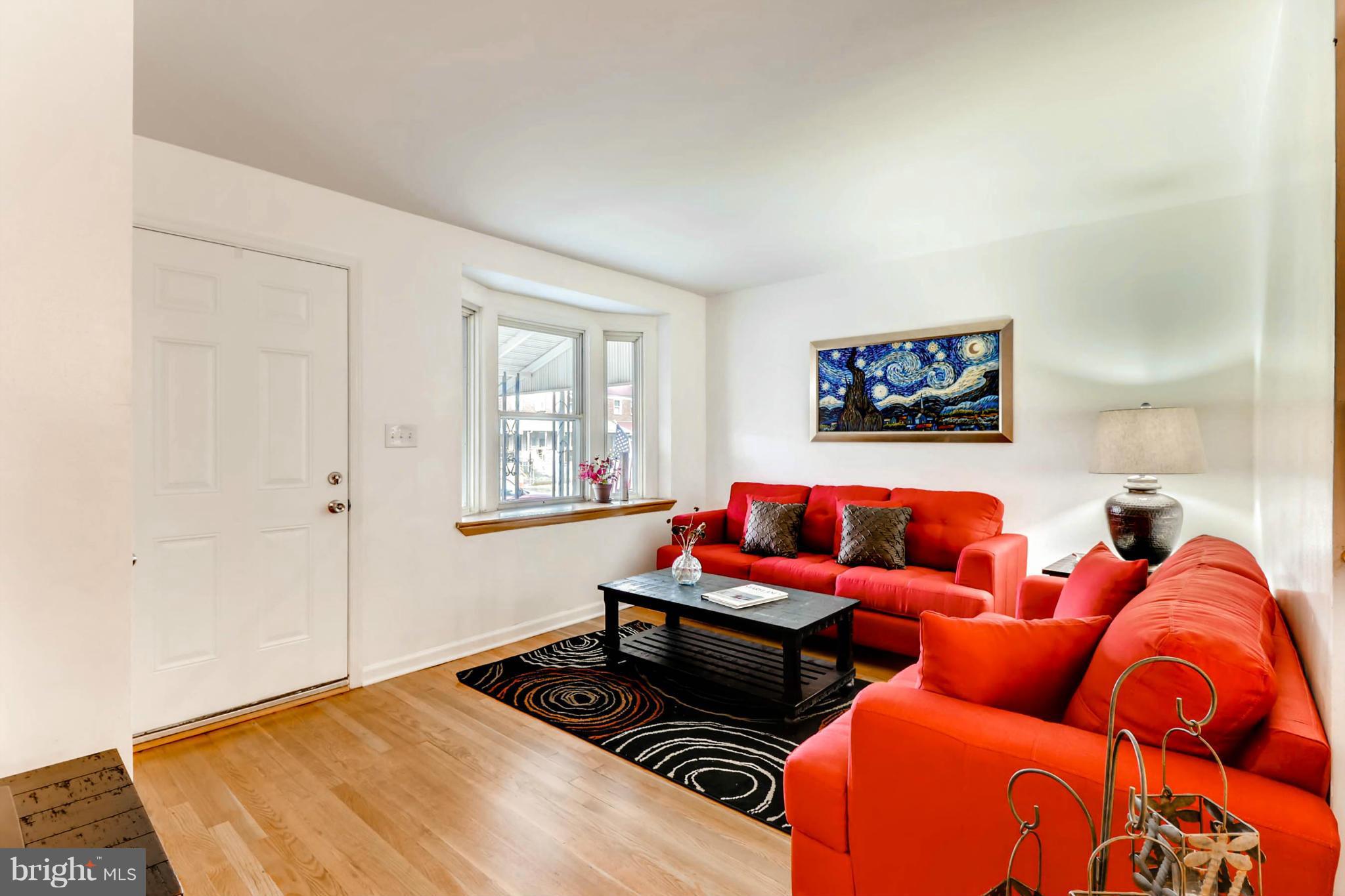 8405 Kavanagh Road Baltimore, MD 21222 - Photo 21 of 30 a bedroom with furniture and a window