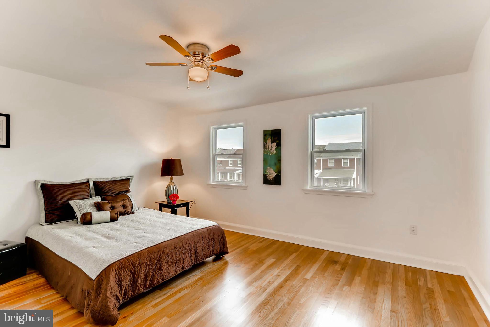 8405 Kavanagh Road Baltimore, MD 21222 - Photo 30 of 30 a bedroom with a bed and window