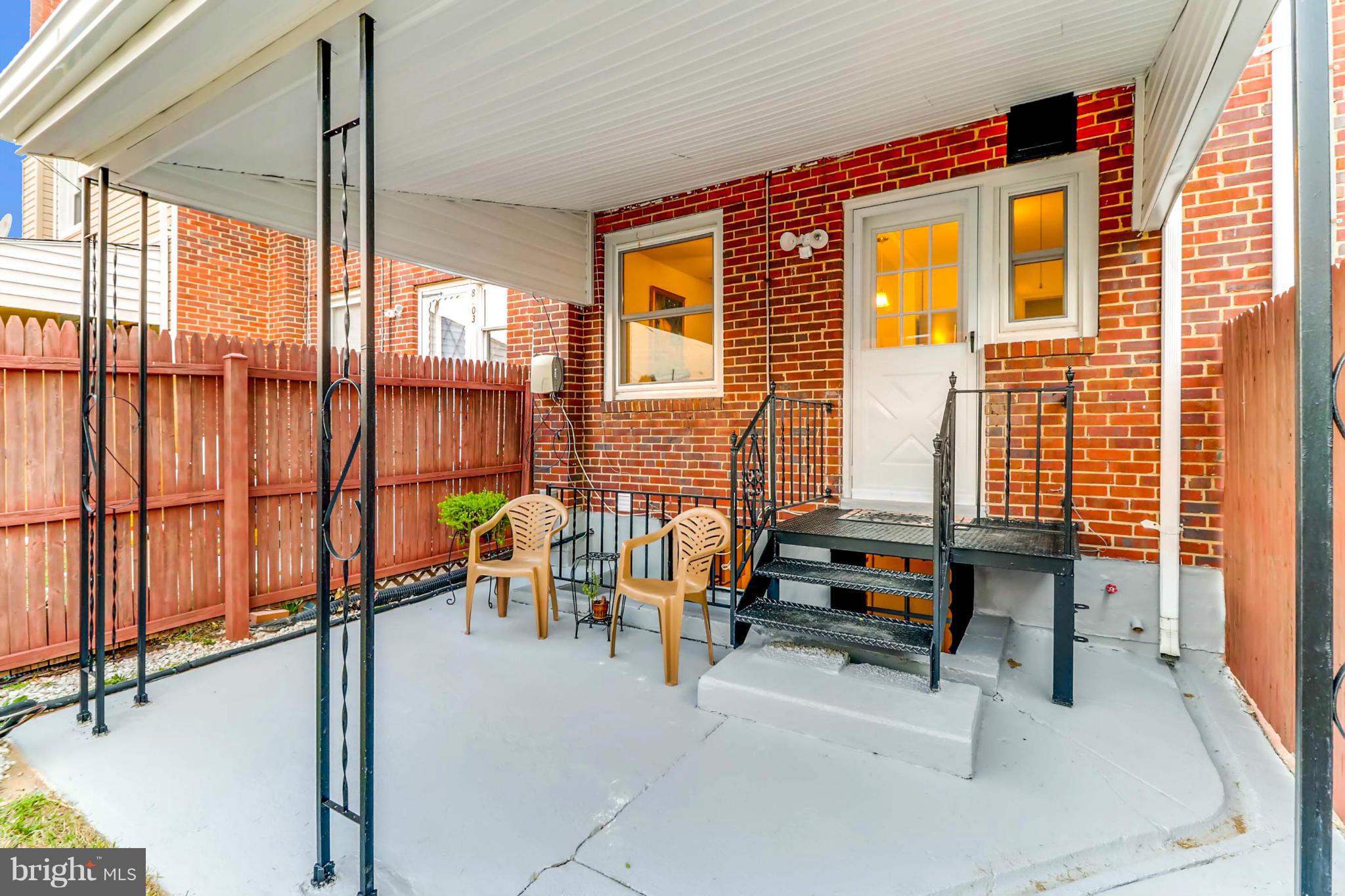 8405 Kavanagh Road Baltimore, MD 21222 - Photo 6 of 30 a dining room with furniture and a window