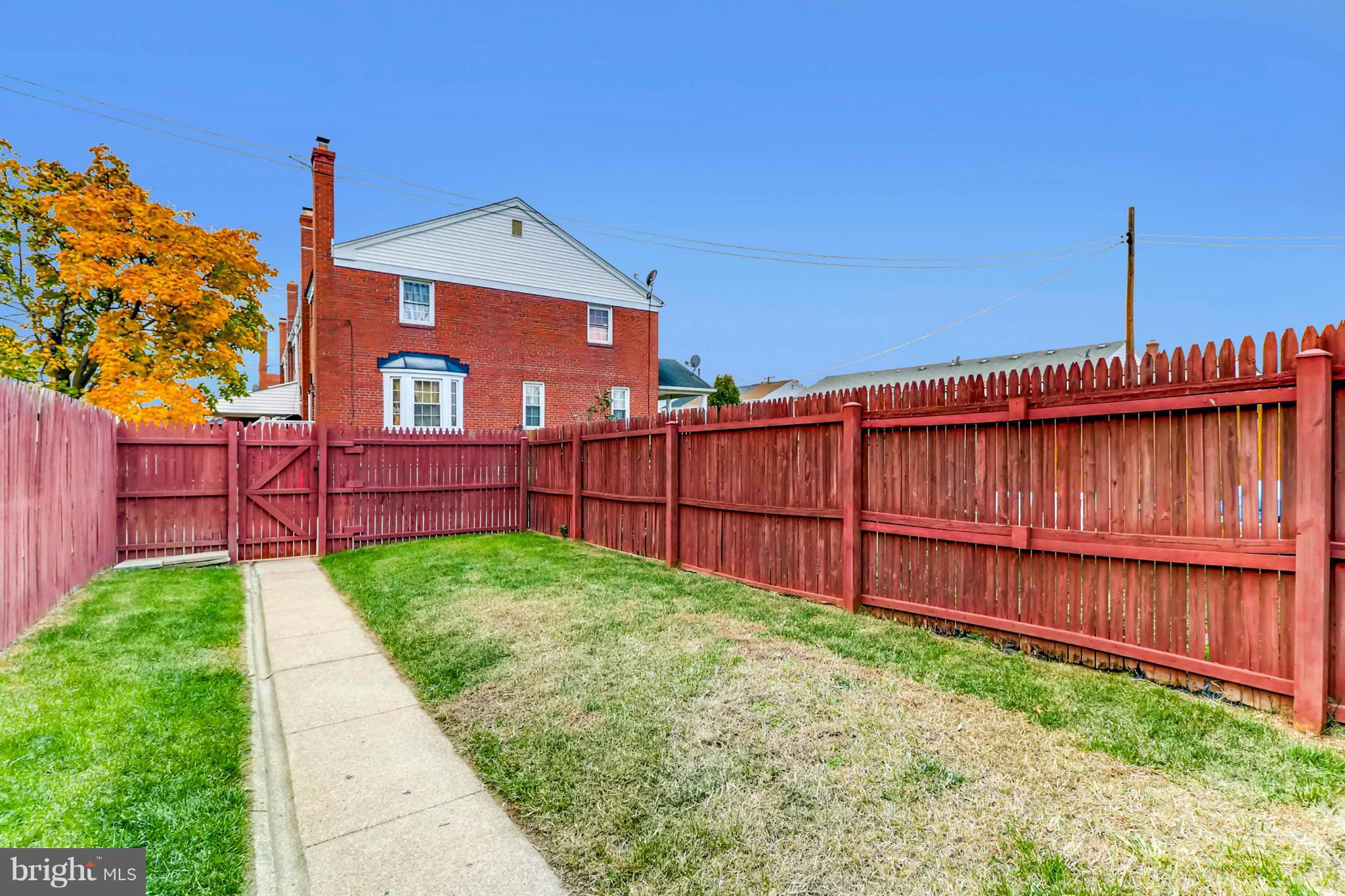 8405 Kavanagh Road Baltimore, MD 21222 - Photo 7 of 30 a view of a backyard with wooden fence