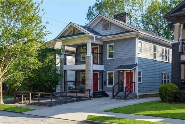 front view of a house with a yard