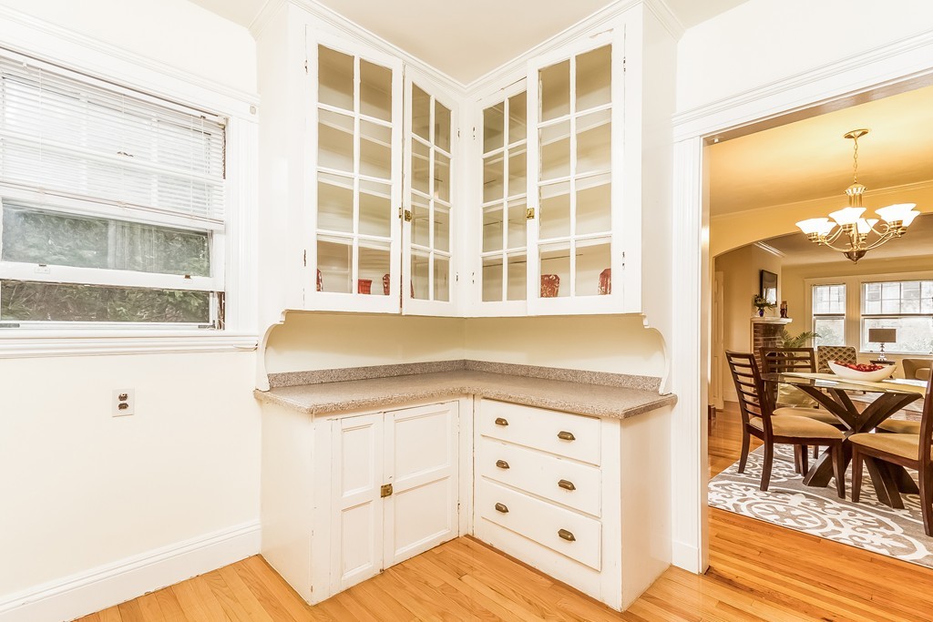 20 Buckminster Road, Unit 1 Brookline, MA 02445 - Photo 8 of 16 a view of a kitchen with cabinets