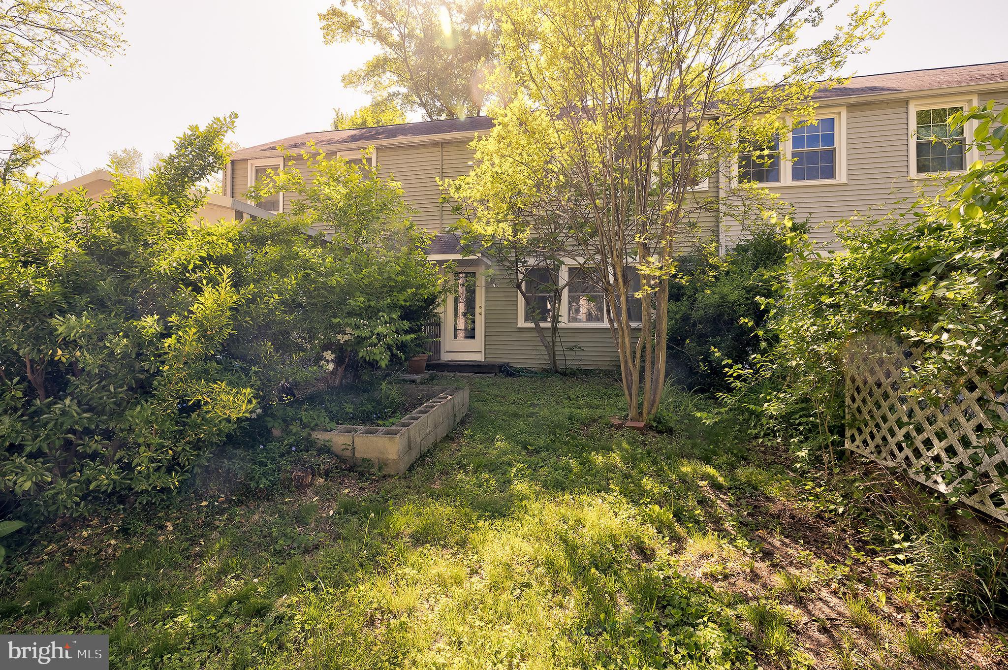 71 Ridge Road Greenbelt, MD 20770 - Photo 24 of 24 a view of a house with a yard