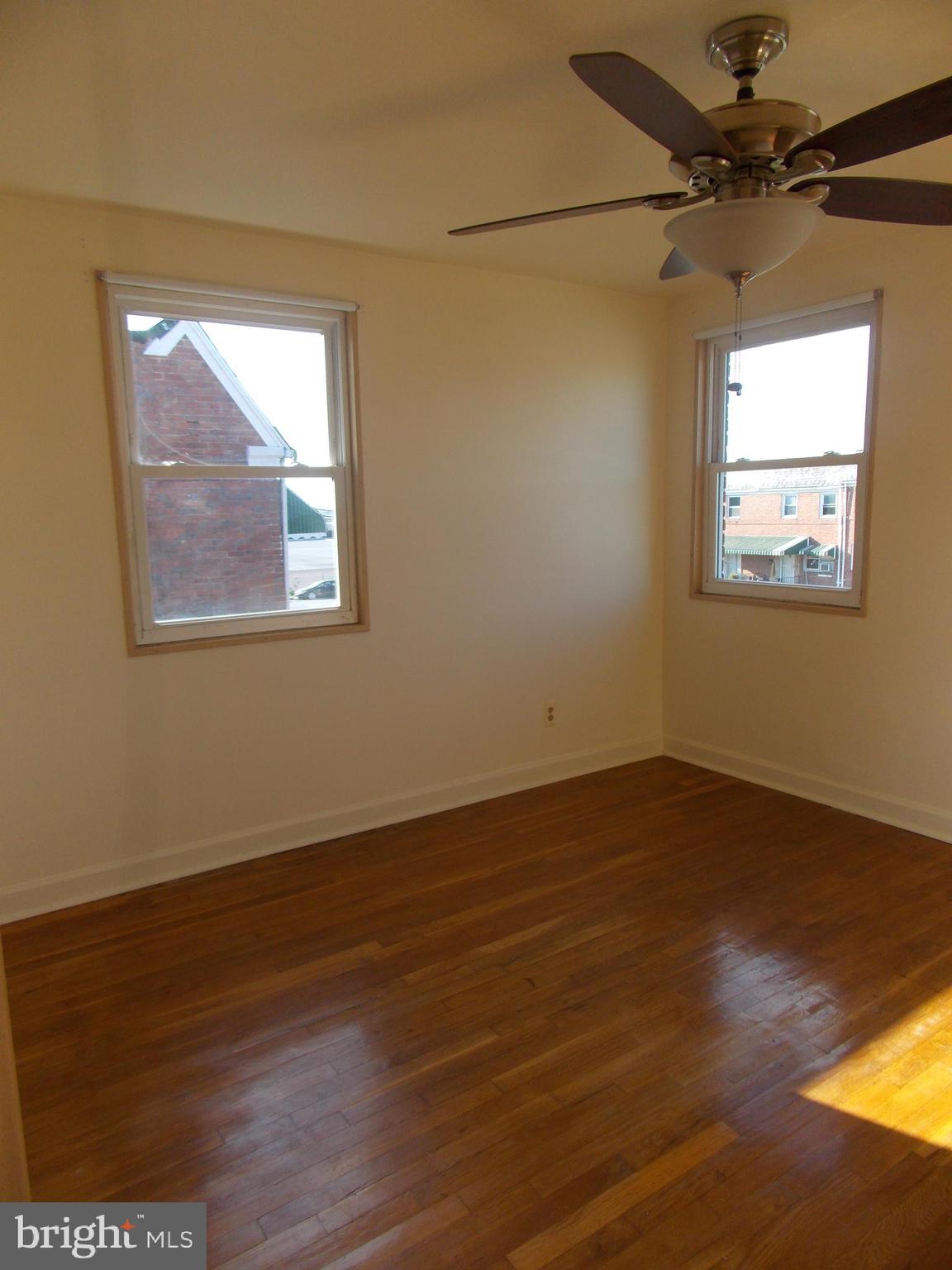 7713 Wynbrook Road Baltimore, MD 21224 - Photo 13 of 18 Master bedroom with 3 windows