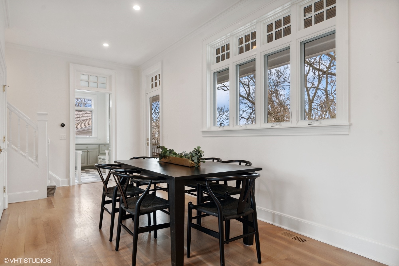 1241 Edgewood Road Lake Forest, IL 60045 - Photo 14 of 46 a view of a dining room with furniture and wooden floor