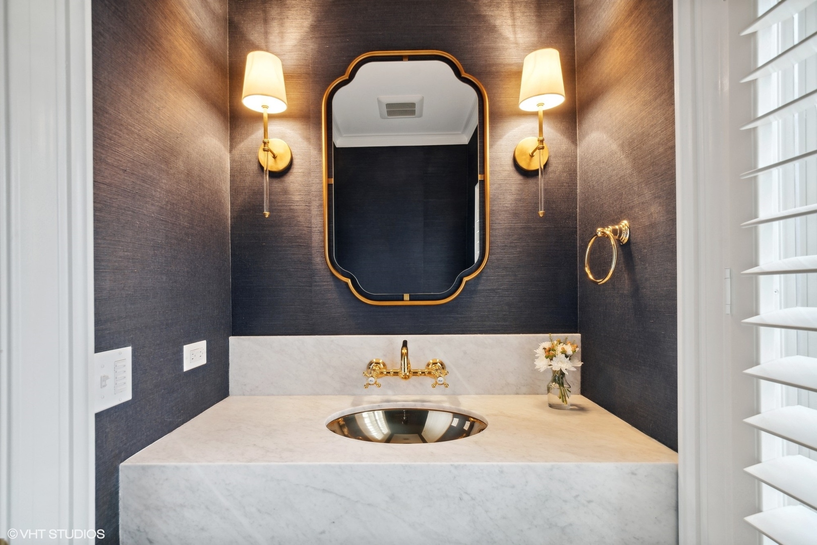 1241 Edgewood Road Lake Forest, IL 60045 - Photo 23 of 46 a bathroom with a sink and a mirror