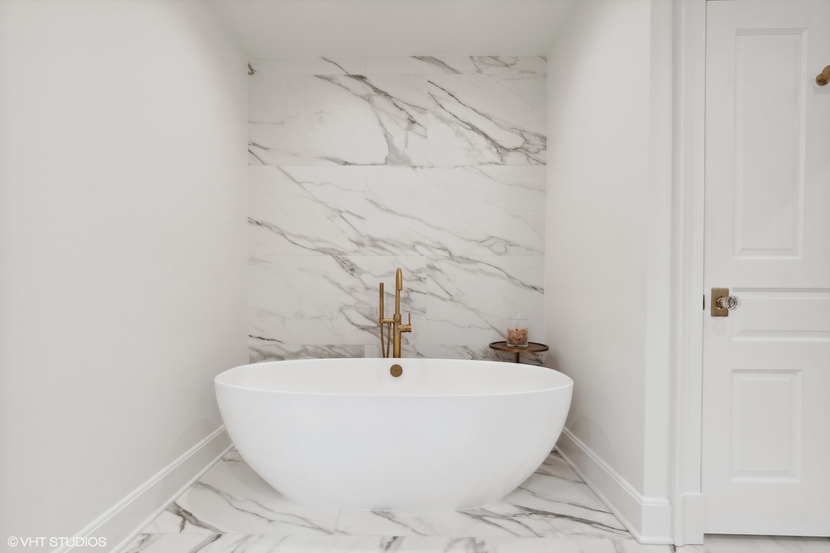 1241 Edgewood Road Lake Forest, IL 60045 - Photo 29 of 46 a white bath tub sitting in a bathroom