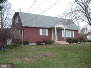 43 Highbridge Road New Egypt, NJ 08533 - Photo 1 of 6 a front view of a house with a garden
