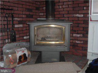 43 Highbridge Road New Egypt, NJ 08533 - Photo 5 of 6 a closeup of a fireplace