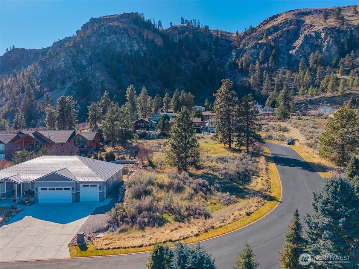 15315 Lakeview Street Entiat, WA 98822 - Photo 12 of 35 a view of a town with mountains and large trees