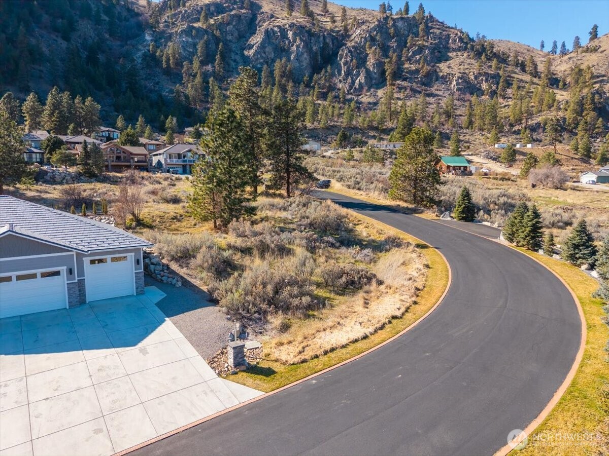 15315 Lakeview Street Entiat, WA 98822 - Photo 13 of 35 a view of a swimming pool with a yard