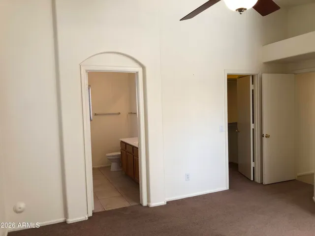 a view of a room with a wardrobe space