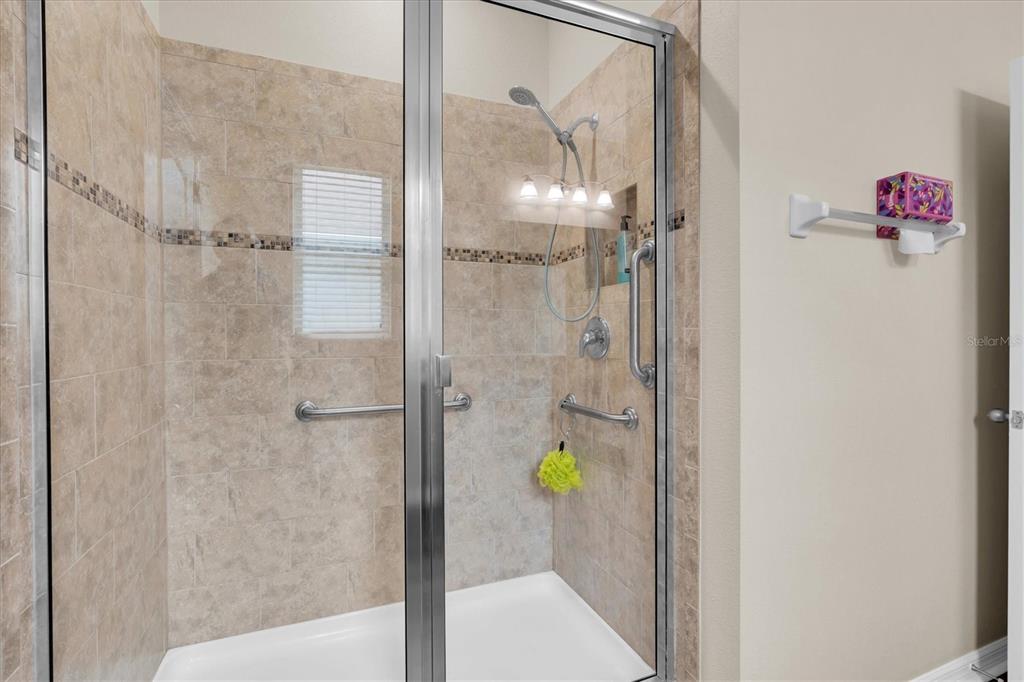 11236 Merganser Way New Port Richey, FL 34654 - Photo 12 of 41 a bathroom with a shower