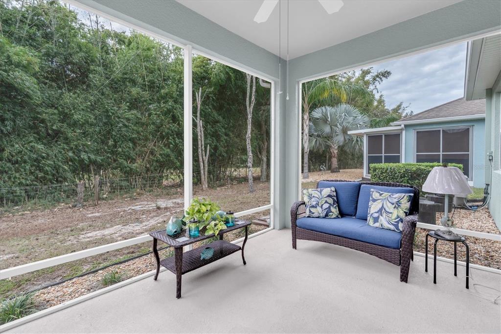 11236 Merganser Way New Port Richey, FL 34654 - Photo 20 of 41 a living room with couch and a large window