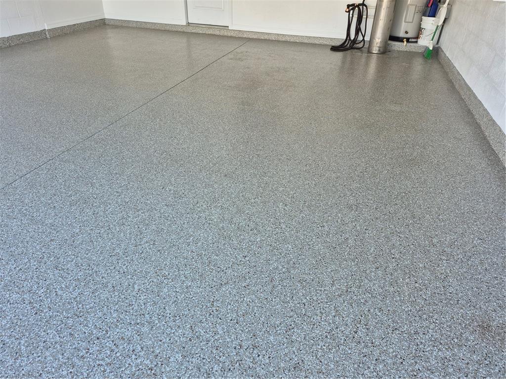 11236 Merganser Way New Port Richey, FL 34654 - Photo 26 of 41 a view of a room with racks on the wall