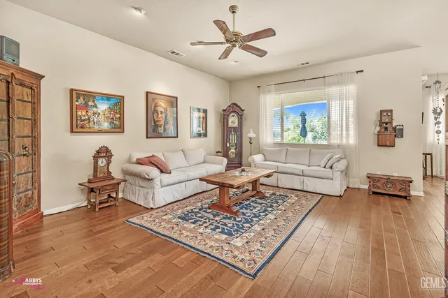 a living room with furniture and a table