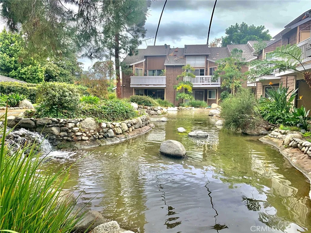 12555 Euclid Street, Unit 21 Garden Grove, CA 92843 - Photo 1 of 7 a view of a swimming pool with a patio