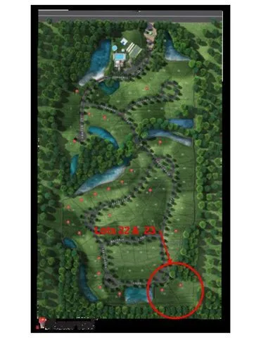 an aerial view of a residential houses with outdoor space and a lake view