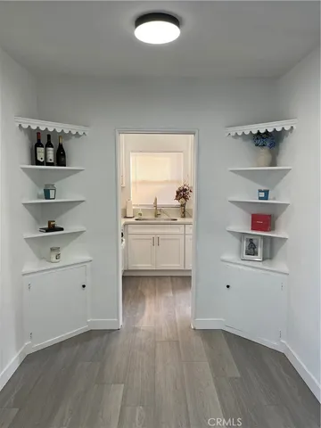 a view of kitchen with wooden floor