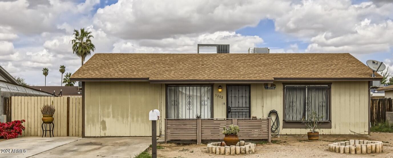 5202 West Berkeley Road Phoenix, AZ 85035 - Photo 1 of 12 a front view of a house