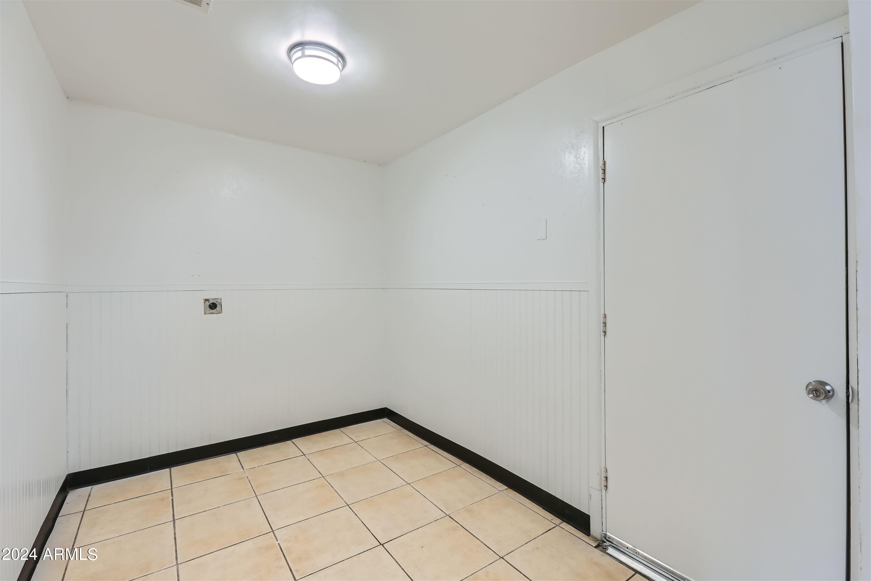 5202 West Berkeley Road Phoenix, AZ 85035 - Photo 7 of 12 a view of empty room