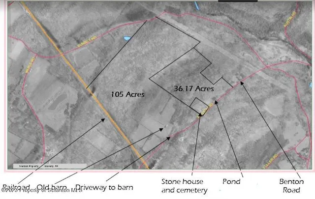 a black and white photo of a house