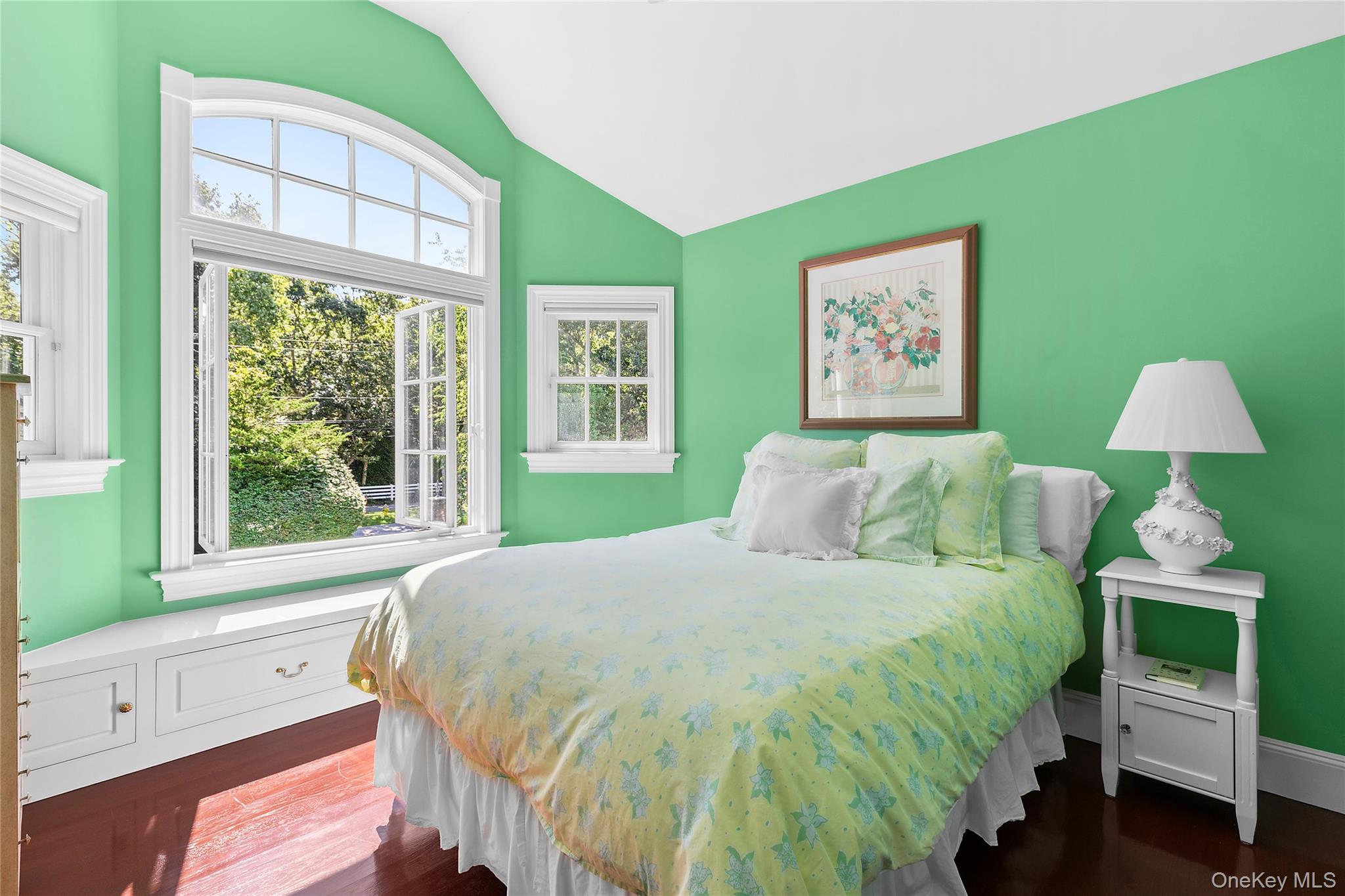 29 Cedar Lane Remsenburg, NY 11960 - Photo 20 of 27 a bedroom with a bed and a window
