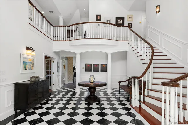 a view of entryway with wooden floor