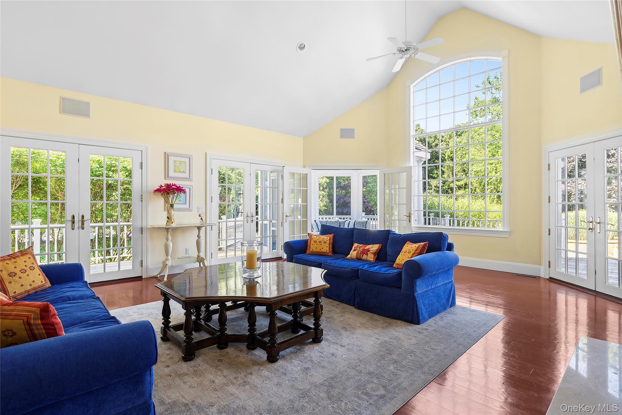 29 Cedar Lane Remsenburg, NY 11960 - Photo 6 of 27 a living room with furniture and a large window