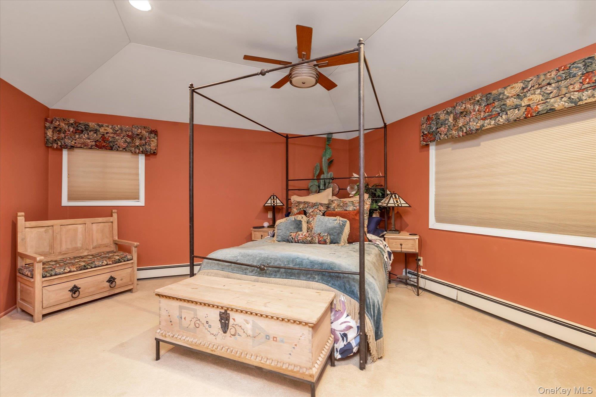 1055 Cedarhurst Street Valley Stream, NY 11581 - Photo 14 of 27 a bedroom with a bed a dresser and window