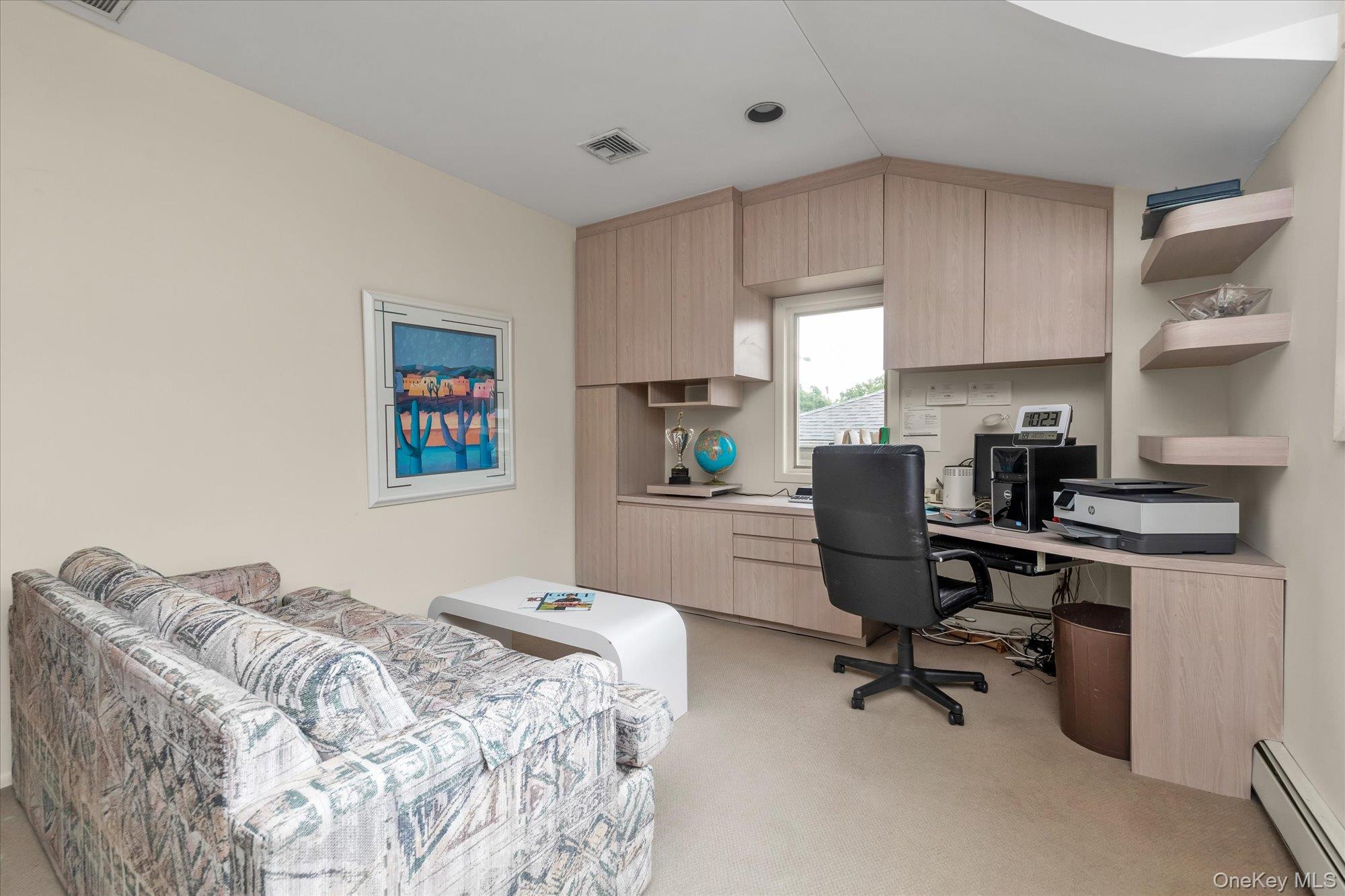 1055 Cedarhurst Street Valley Stream, NY 11581 - Photo 20 of 27 a bedroom with a workspace