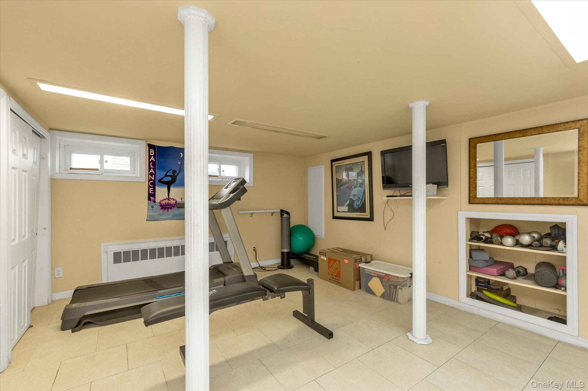 1055 Cedarhurst Street Valley Stream, NY 11581 - Photo 22 of 27 a living room with furniture