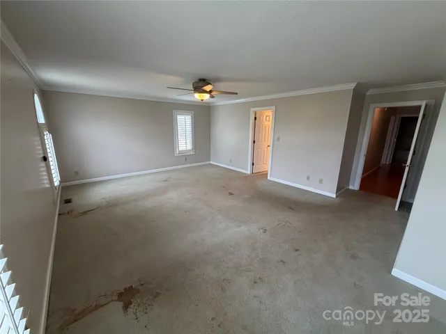 a spacious bathroom with a tub sink shower and mirror