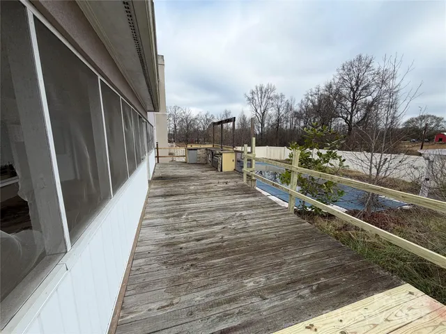 a view of a backyard with a patio