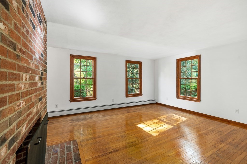 10 Hidden Ledge Road Manchester, MA 01944 - Photo 16 of 40 a view of an empty room with a window