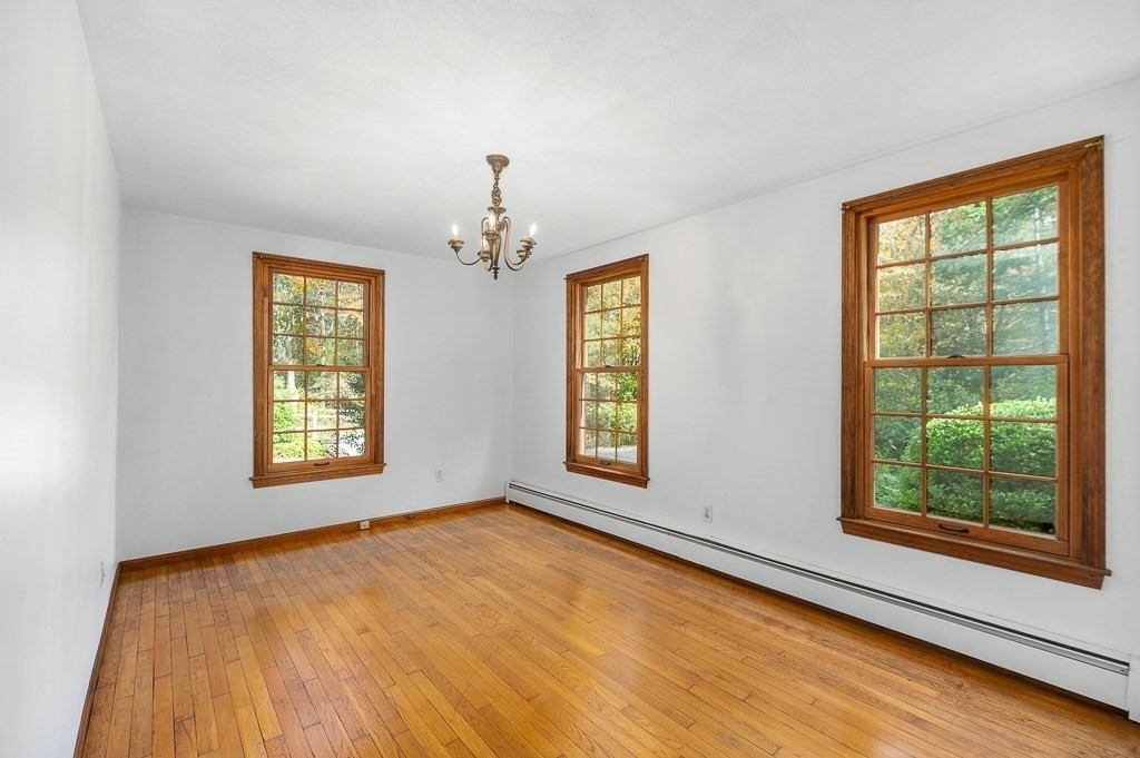 10 Hidden Ledge Road Manchester, MA 01944 - Photo 18 of 40 a view of an empty room with a window