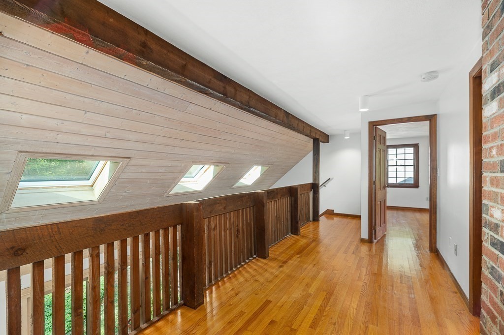 10 Hidden Ledge Road Manchester, MA 01944 - Photo 20 of 40 a view of gallery with wooden floor