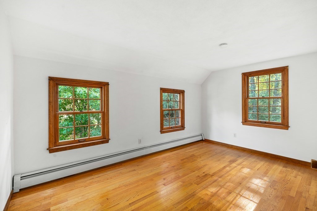 10 Hidden Ledge Road Manchester, MA 01944 - Photo 25 of 40 a view of an empty room with a window