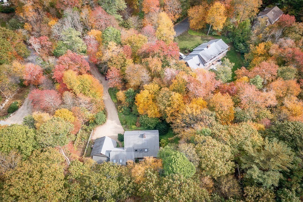 10 Hidden Ledge Road Manchester, MA 01944 - Photo 36 of 40 a roof of a house with lots of green space