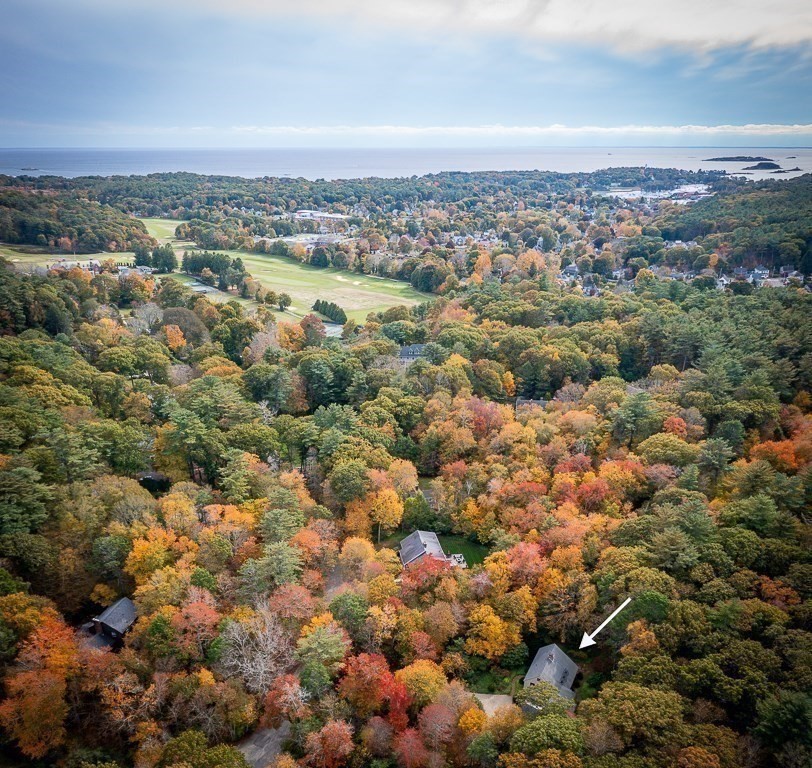 10 Hidden Ledge Road Manchester, MA 01944 - Photo 37 of 40 an aerial view of a residential houses with city view
