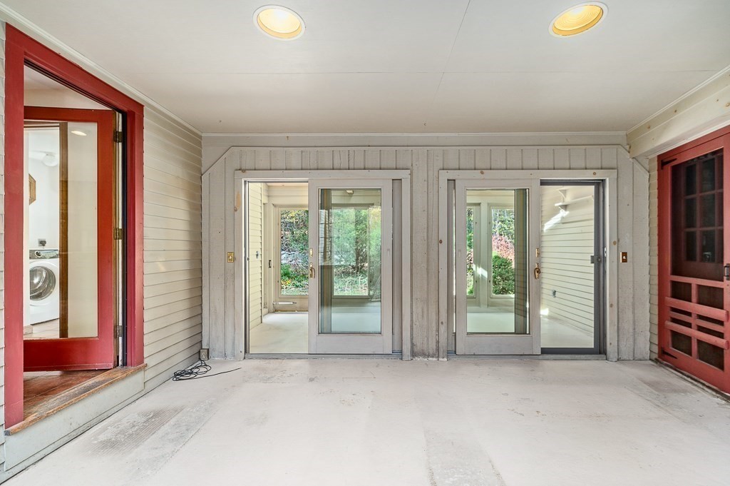 10 Hidden Ledge Road Manchester, MA 01944 - Photo 6 of 40 a view of an empty room with a window